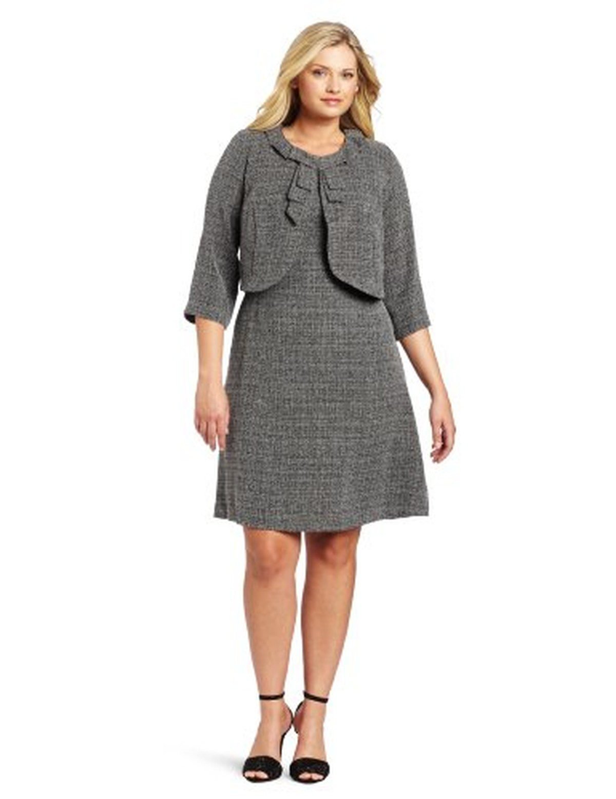 Plus size woman wearing a tweed jacket over a dress for fall