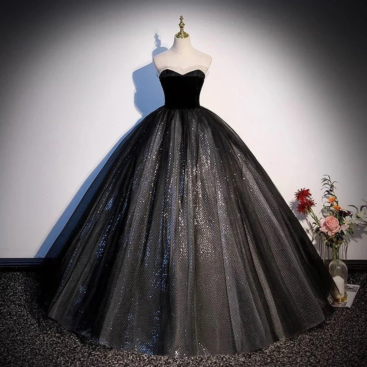 Plus size woman in a velvet bodice and tulle skirt dress for a wedding