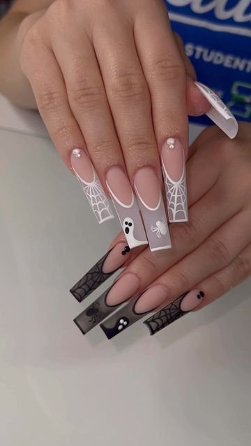 Ghost white micro French tips on black Halloween nails