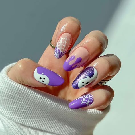 Witchy purple micro French tip Halloween nails