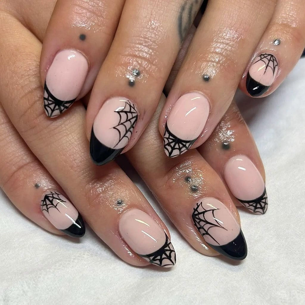 Long nails with black spiderweb french tip nail design