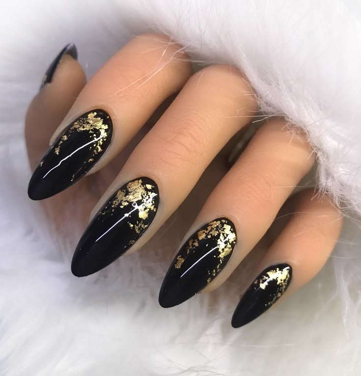Black and gold foil gothic long nail design