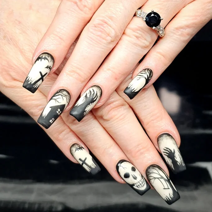 Long coffin nails with spooky graveyard scene nail art