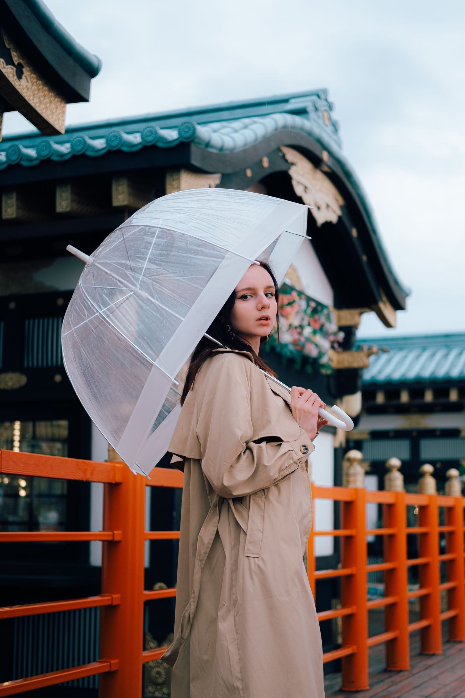 Yellow umbrella with olive field jacket fall outfit