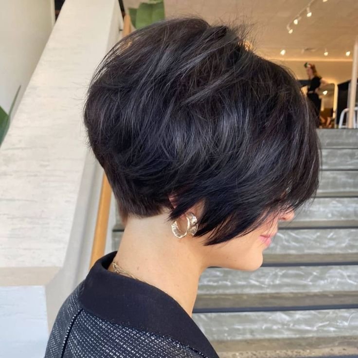 Bixie haircut with long side bangs