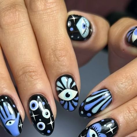 Black long nails with evil eye protection nail art