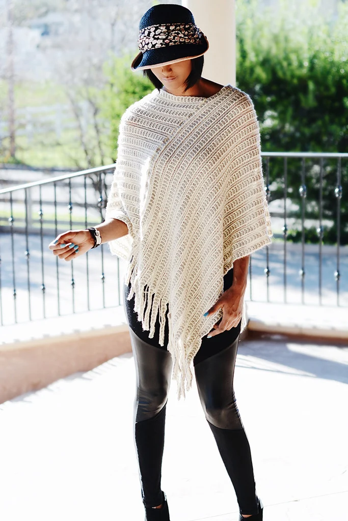 Knit poncho with leggings and boots fall outdoor outfit
