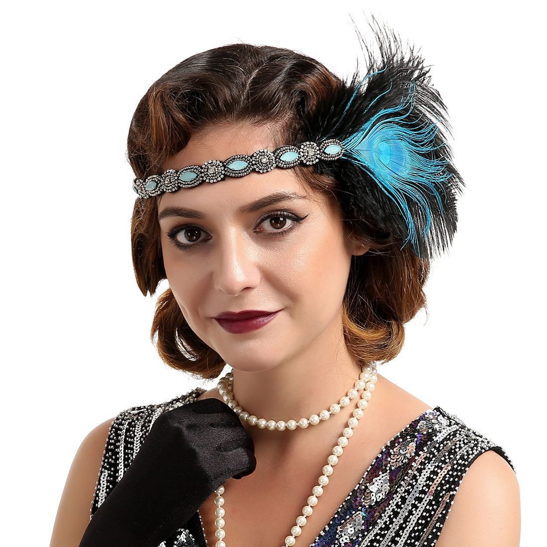 Woman in 1920s flapper dress with feather headband costume