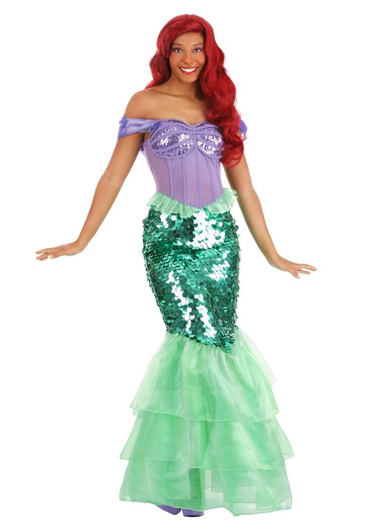 Woman in mermaid Halloween costume with sequin tail