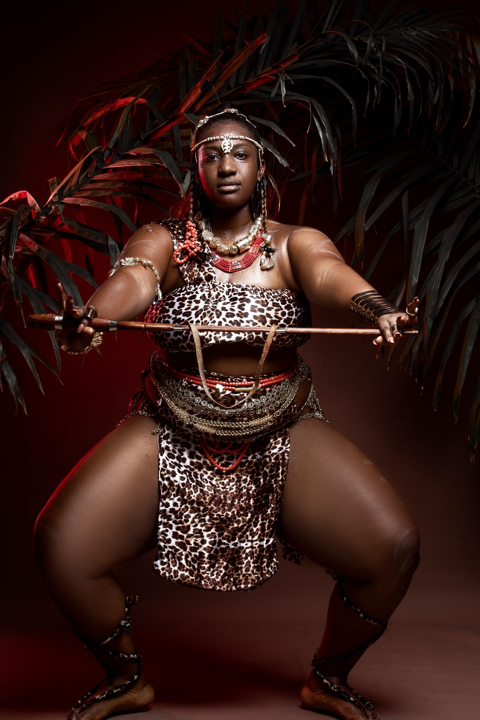 Black woman dressed as a tribal warrior princess Halloween costume