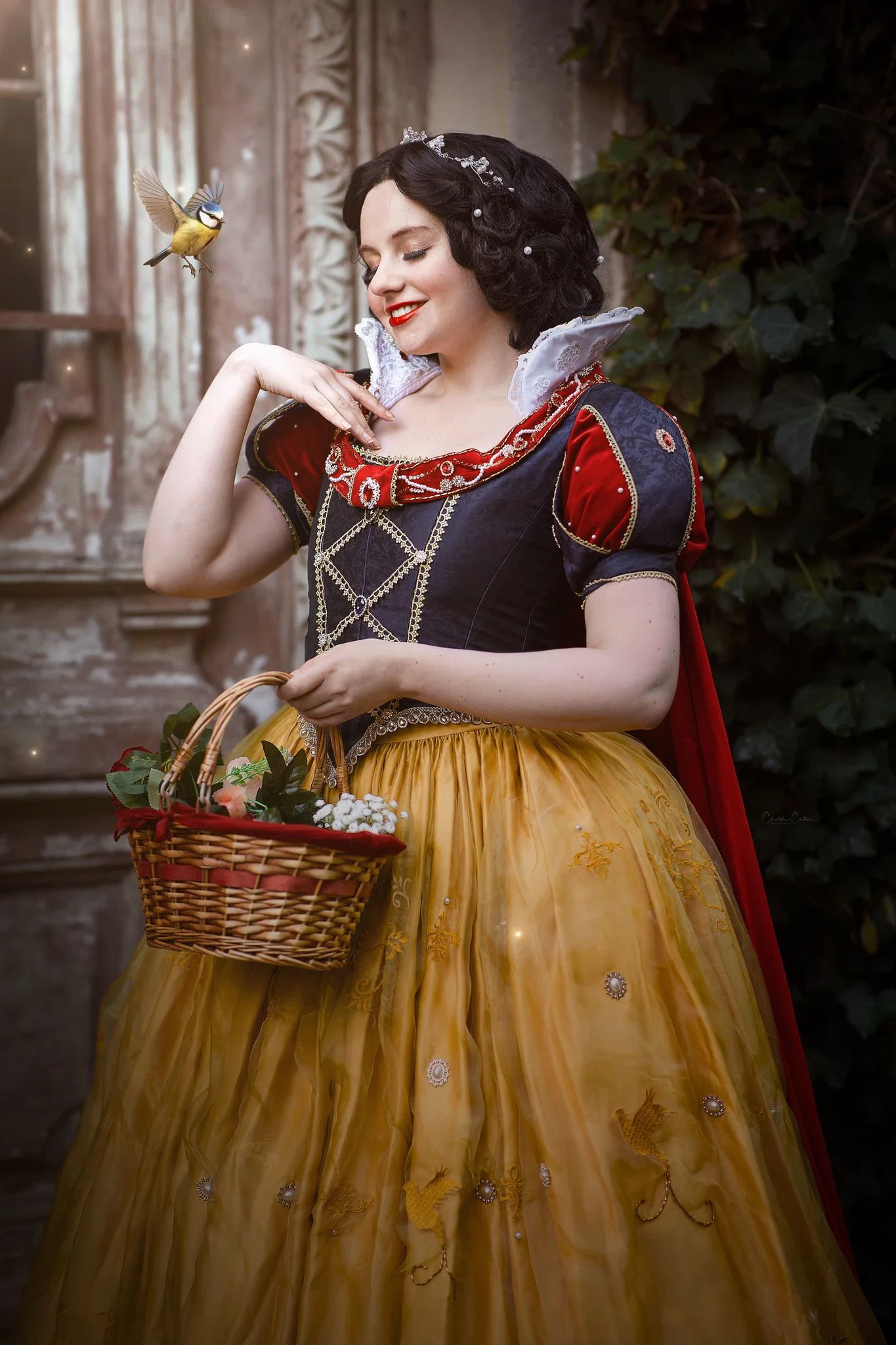 Woman in dark Snow White inspired Halloween costume