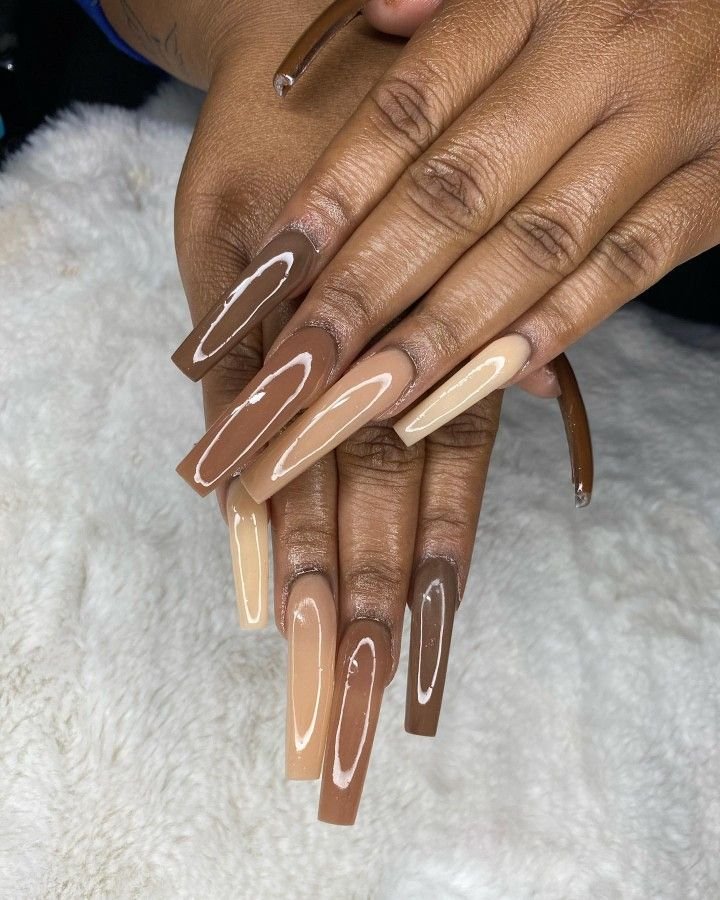 Caramel nude nails on deep skin