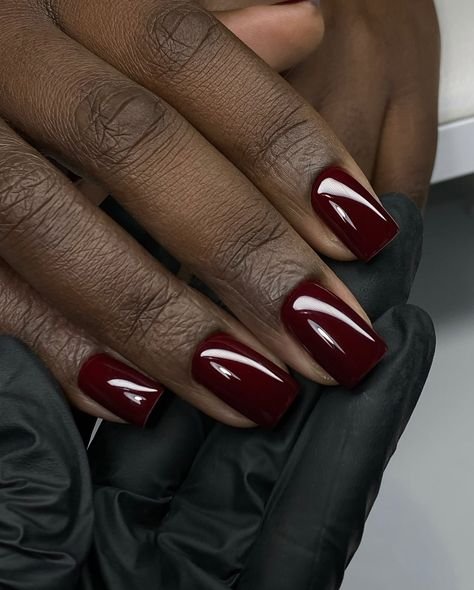 Cherry red nails on deep skin