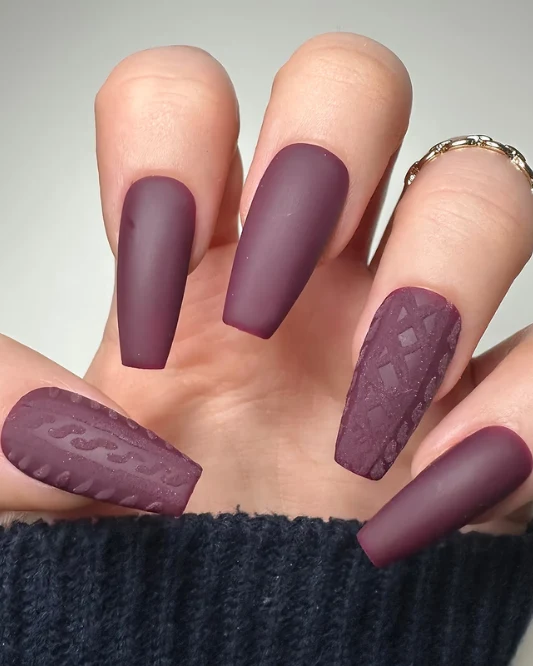 3. Burgundy Knit Pattern Nails