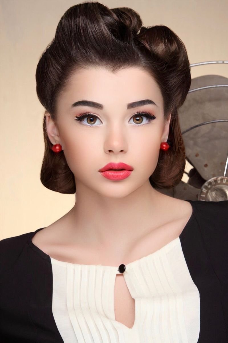 Vintage victory rolls witchy hairstyle