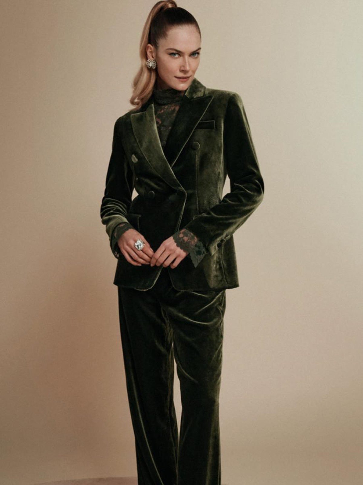 Woman wearing a velvet blazer for a holiday party