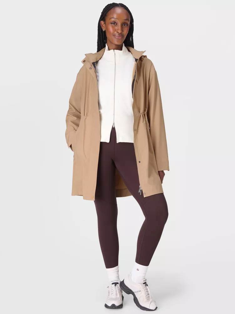 Oversized trench coat with leggings and sneakers casual fall