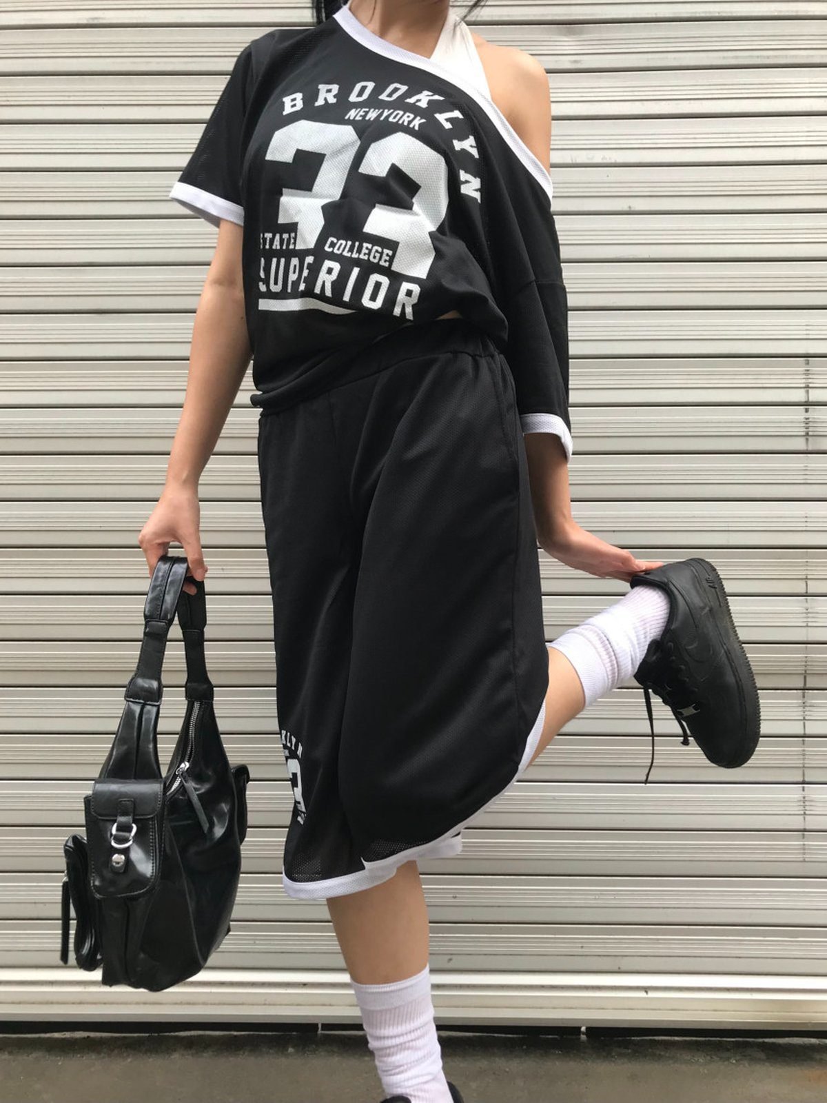 Woman in a matching jersey and shorts set for game day