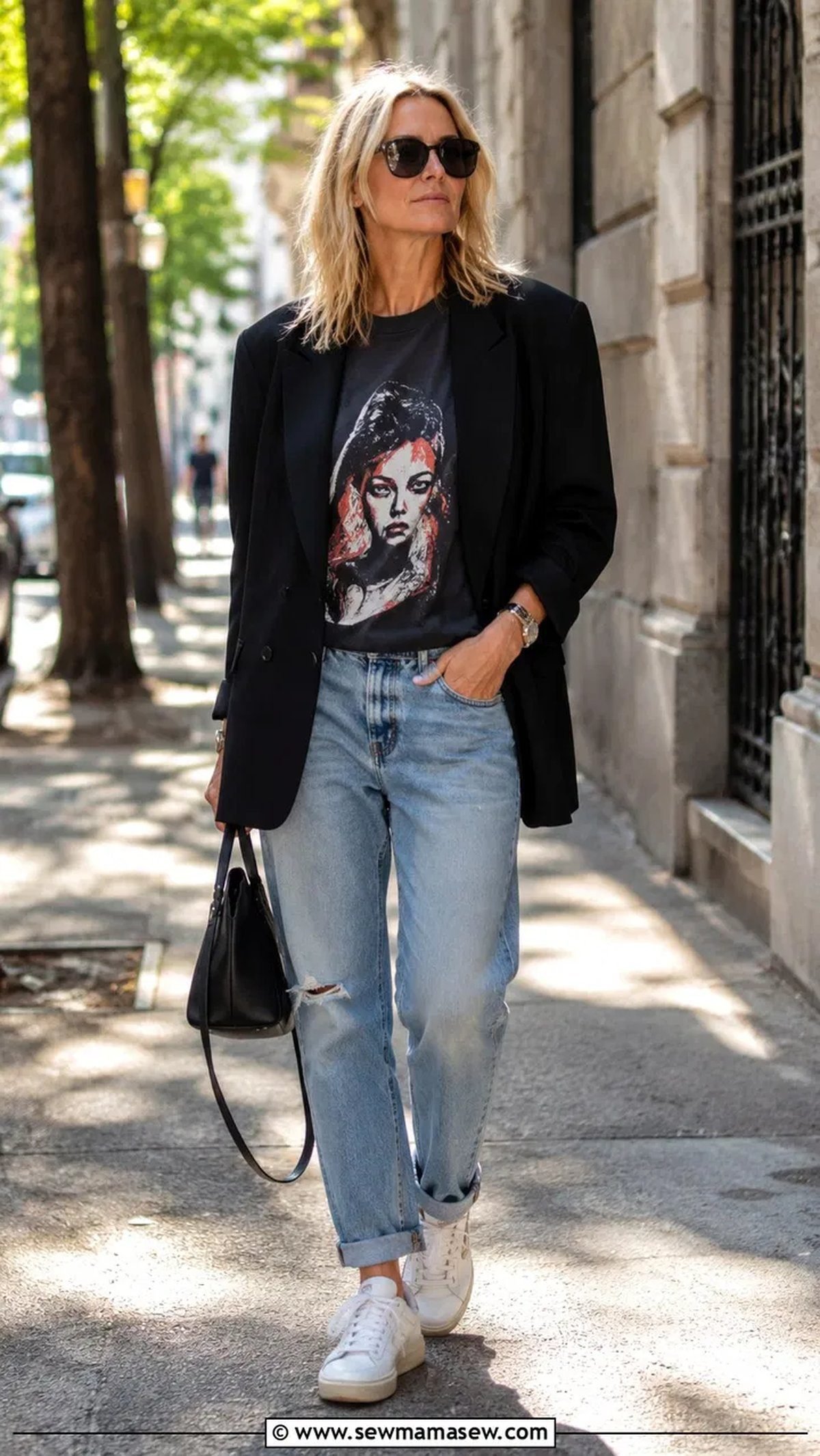 Woman layering an oversized jersey under a blazer for a dressed-up game day