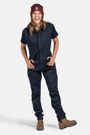 Woman in mechanic costume with jeans and work shirt