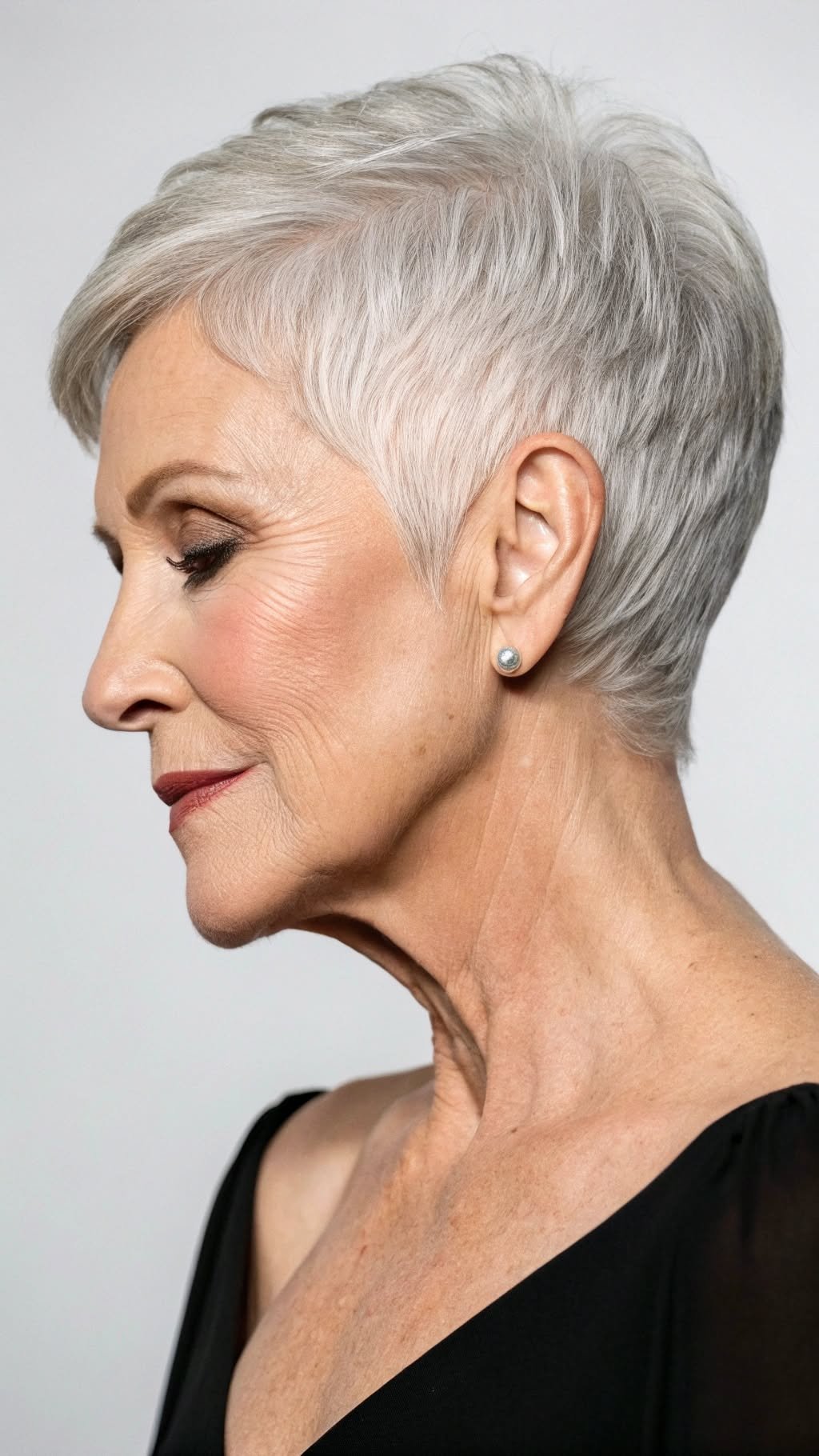 Layered pixie cut with volume for mature women