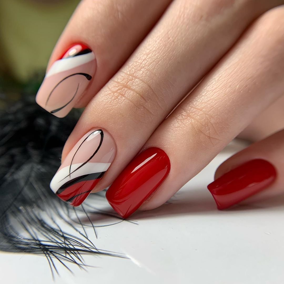 Classic red nails with black half moon accent elegant