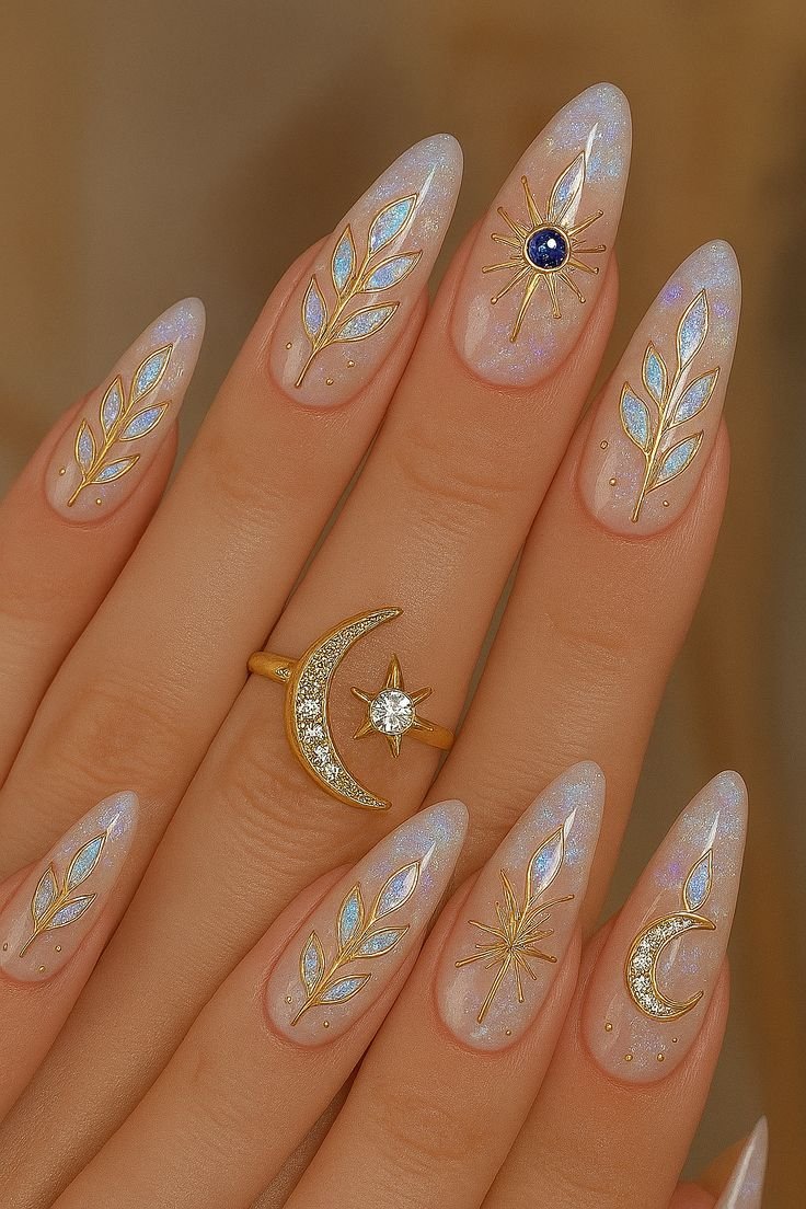 Pearl white nails with gold moon nail art
