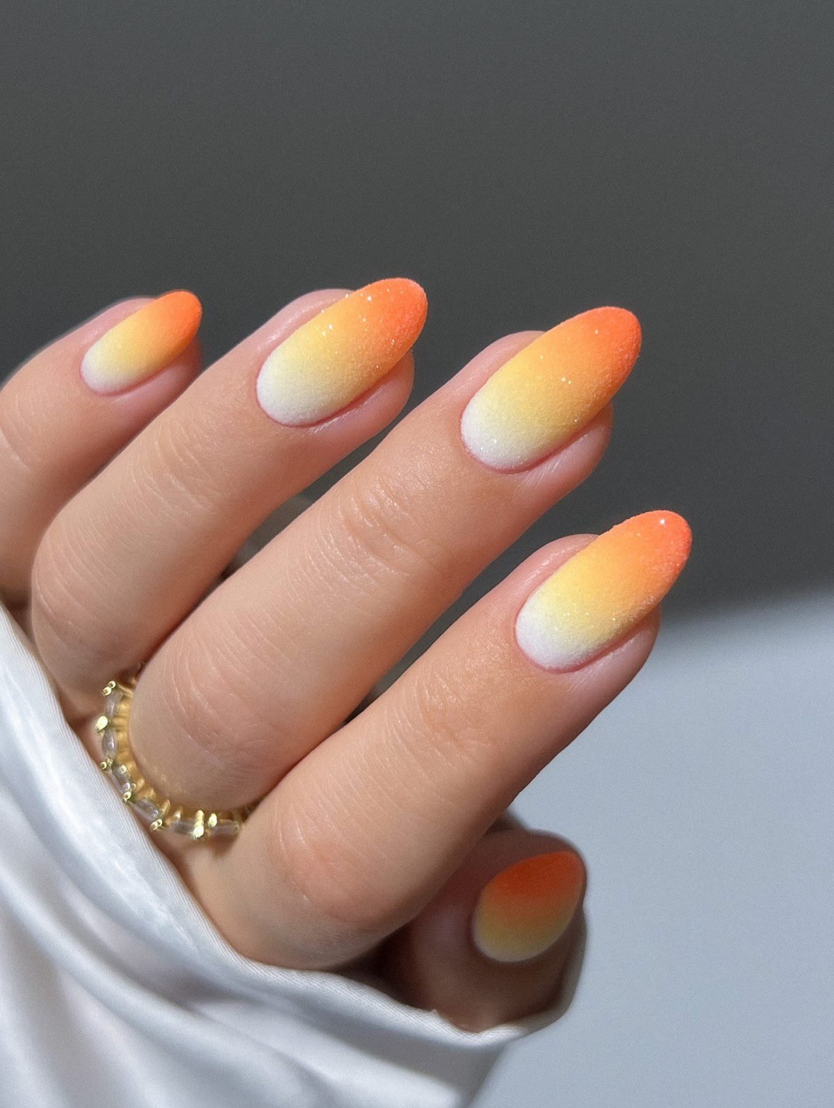 Candy corn almond shaped nails