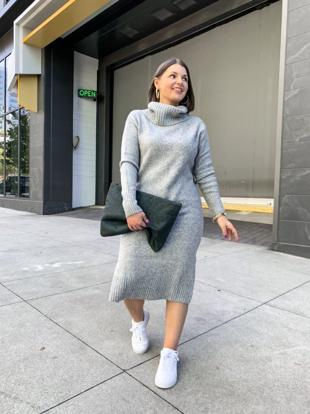 Woman wearing a camel monochrome sweatsuit with tonal sneakers
