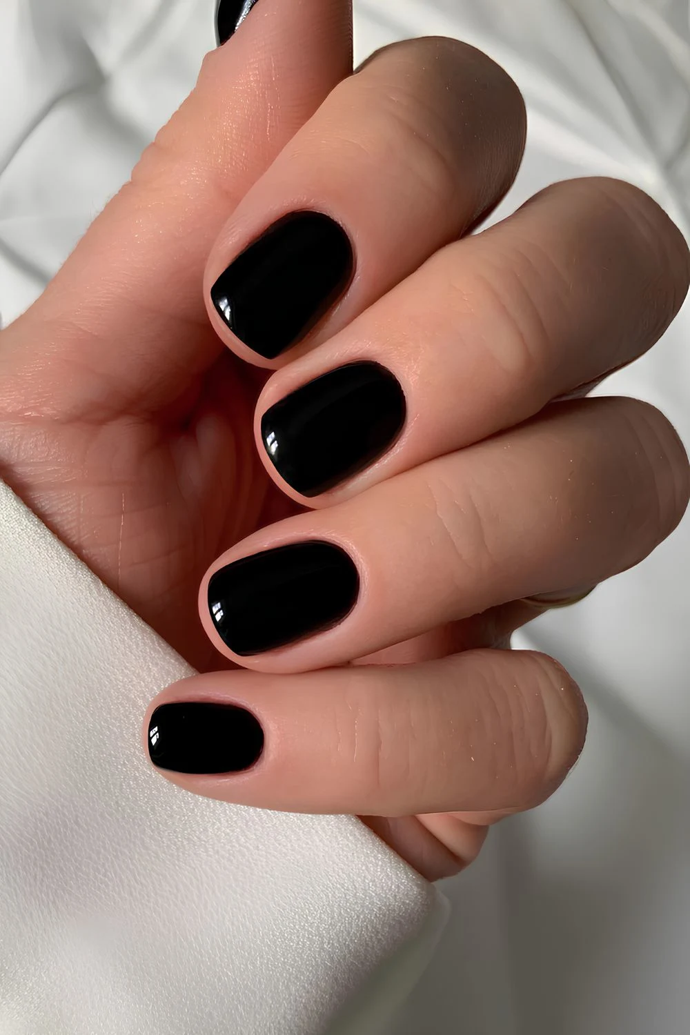 Short glossy black elegant nails