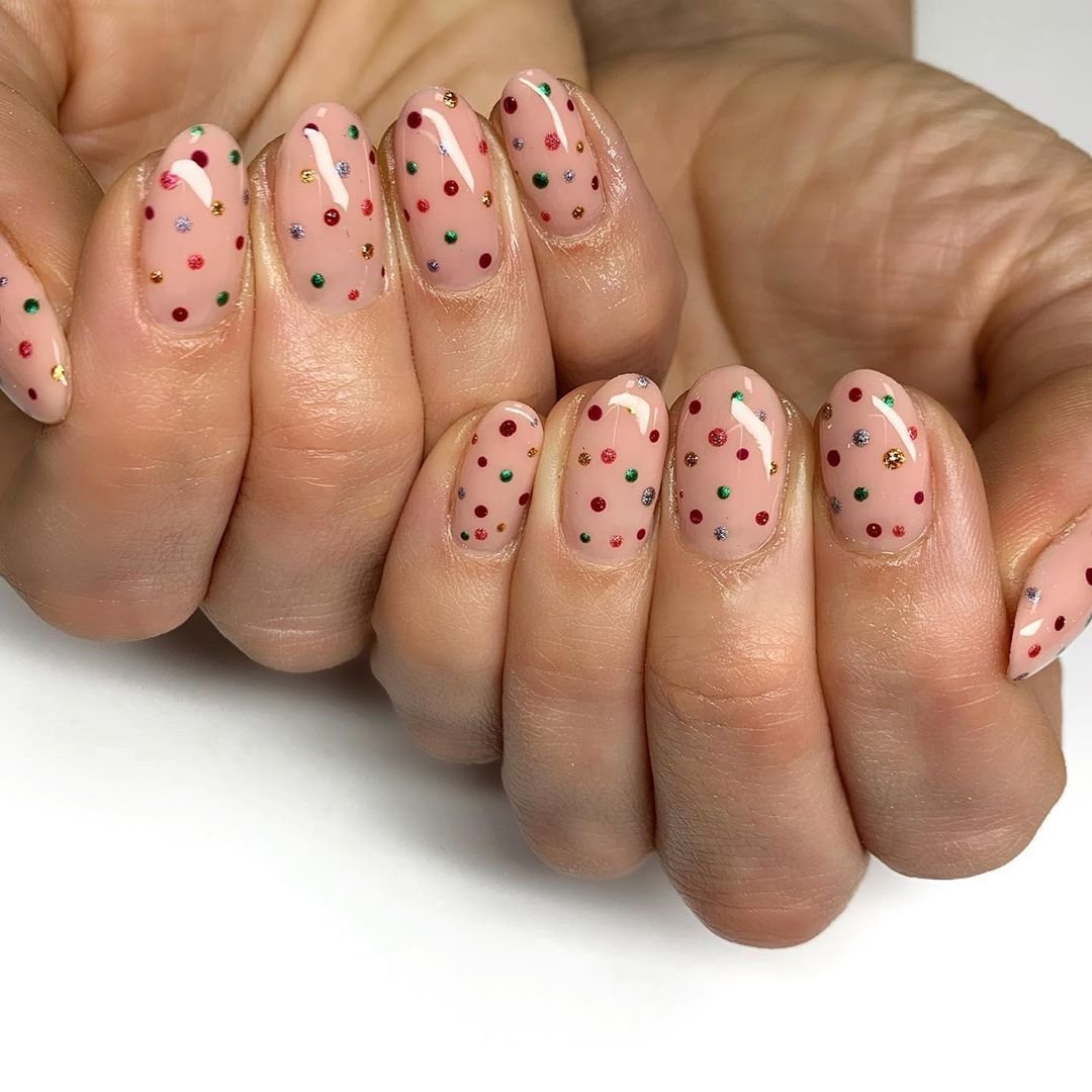 Beginner dotted confetti nail art in fall colors