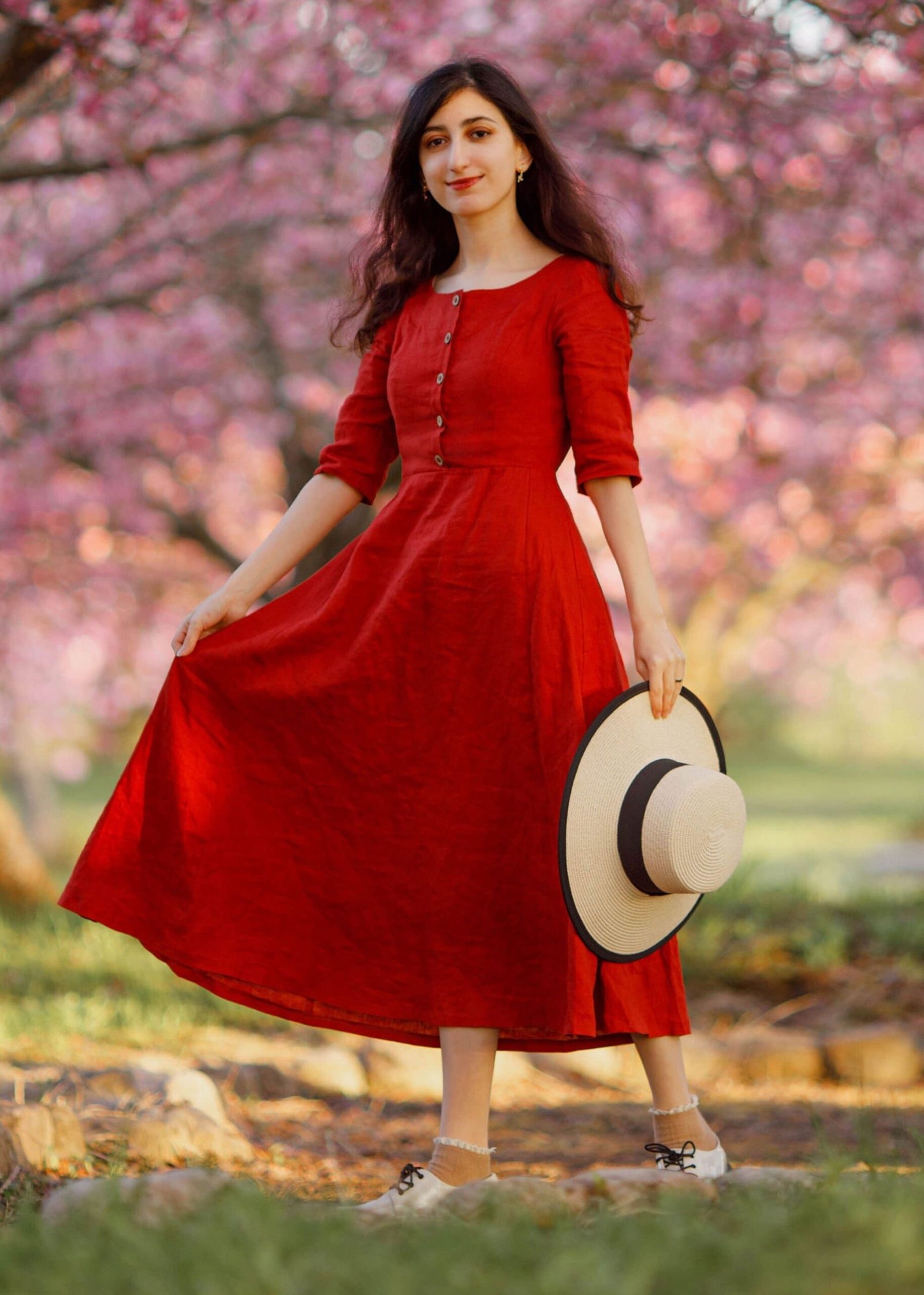 Woman in tomato girl summer linen dress red aesthetic