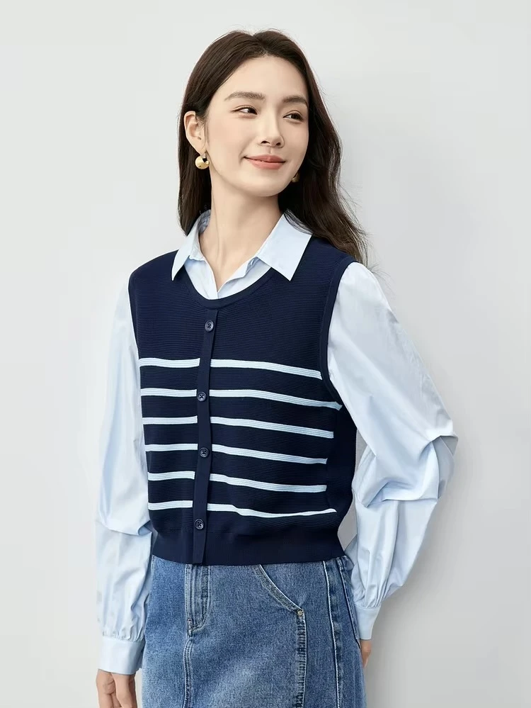 Sweater vest layered over shirt fall preppy layering