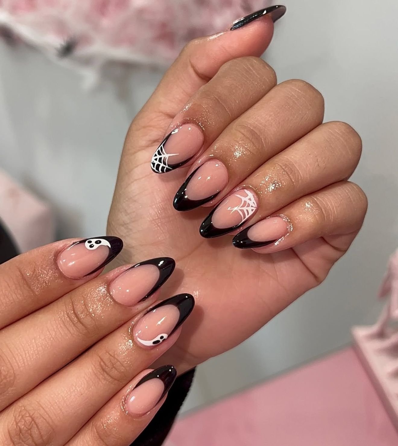 Black french tips on pink Halloween nails