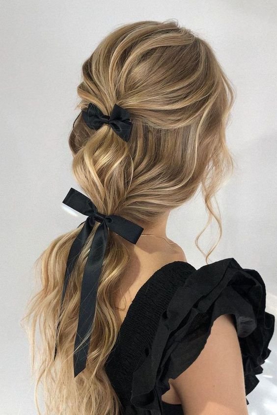 Long hair half up velvet bow festive hairstyle