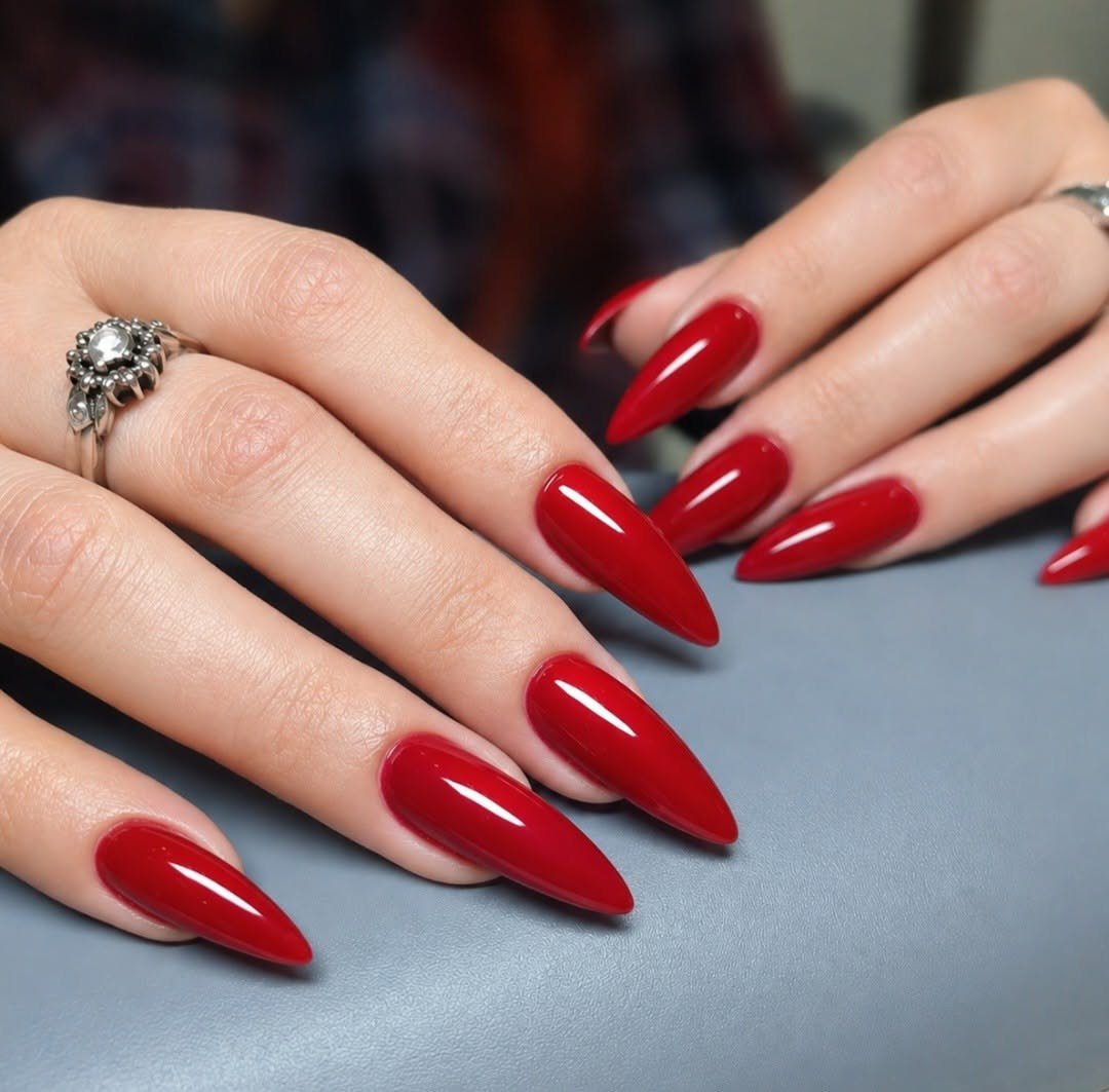 Glossy Red Stiletto Nails