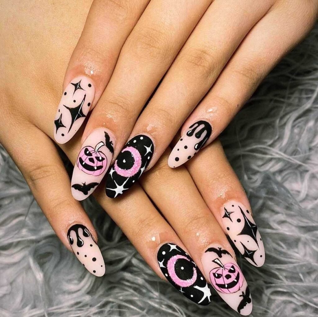 Black and pink polka dot Halloween nails