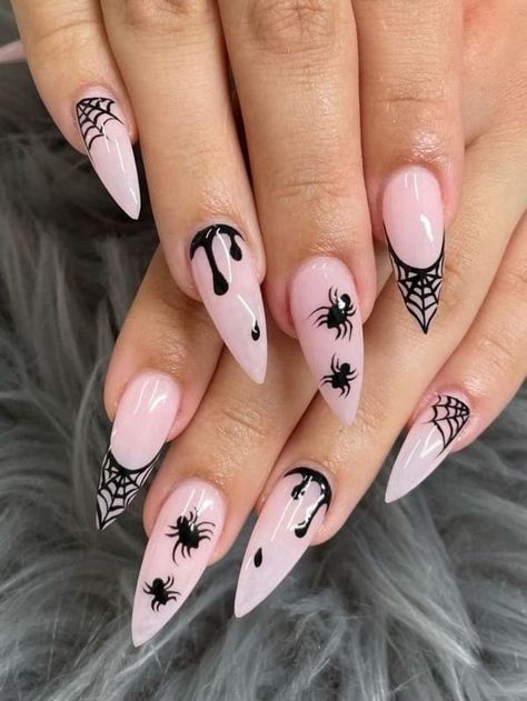 Black spider on pink web Halloween nail art