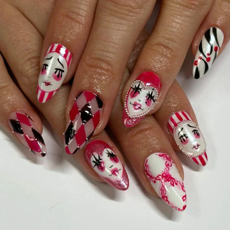 Pink and black harlequin diamond Halloween nails