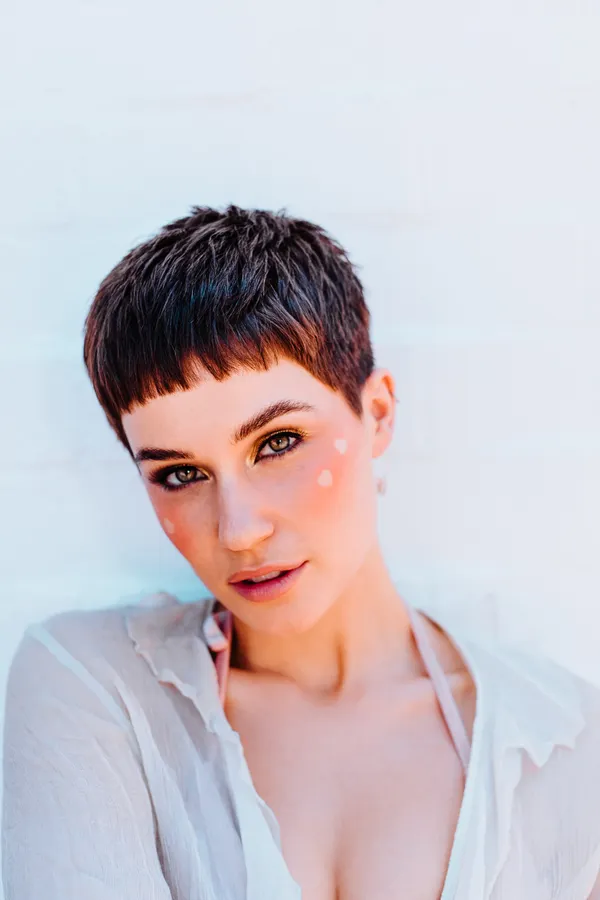 Cropped pixie haircut on a woman
