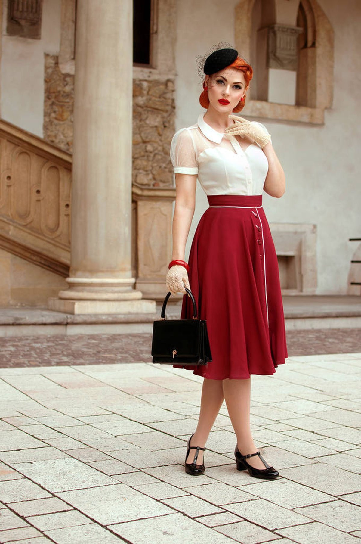 Woman wearing scarlet and cream vintage-inspired game day style