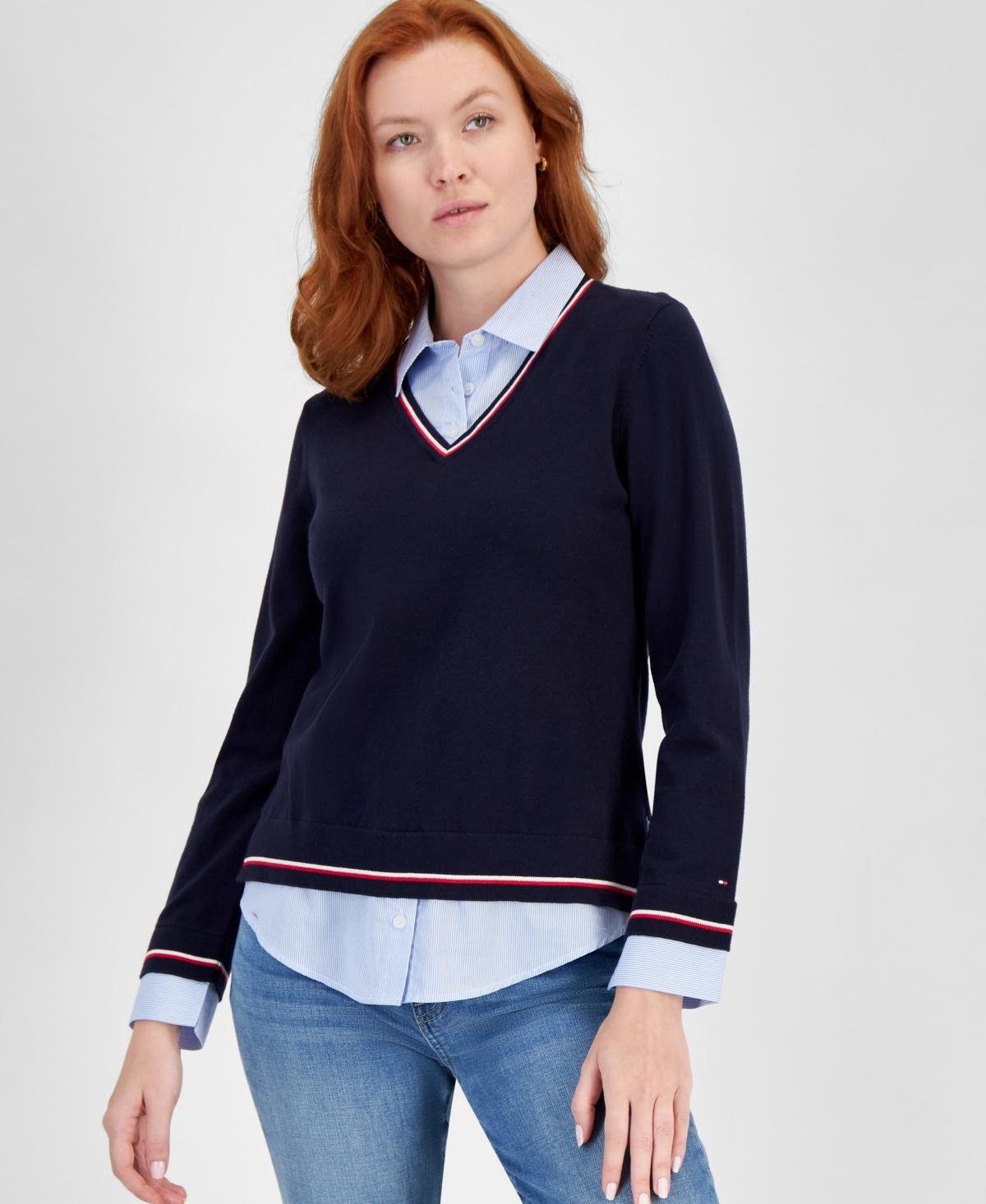 Woman in light blue and navy preppy game day outfit