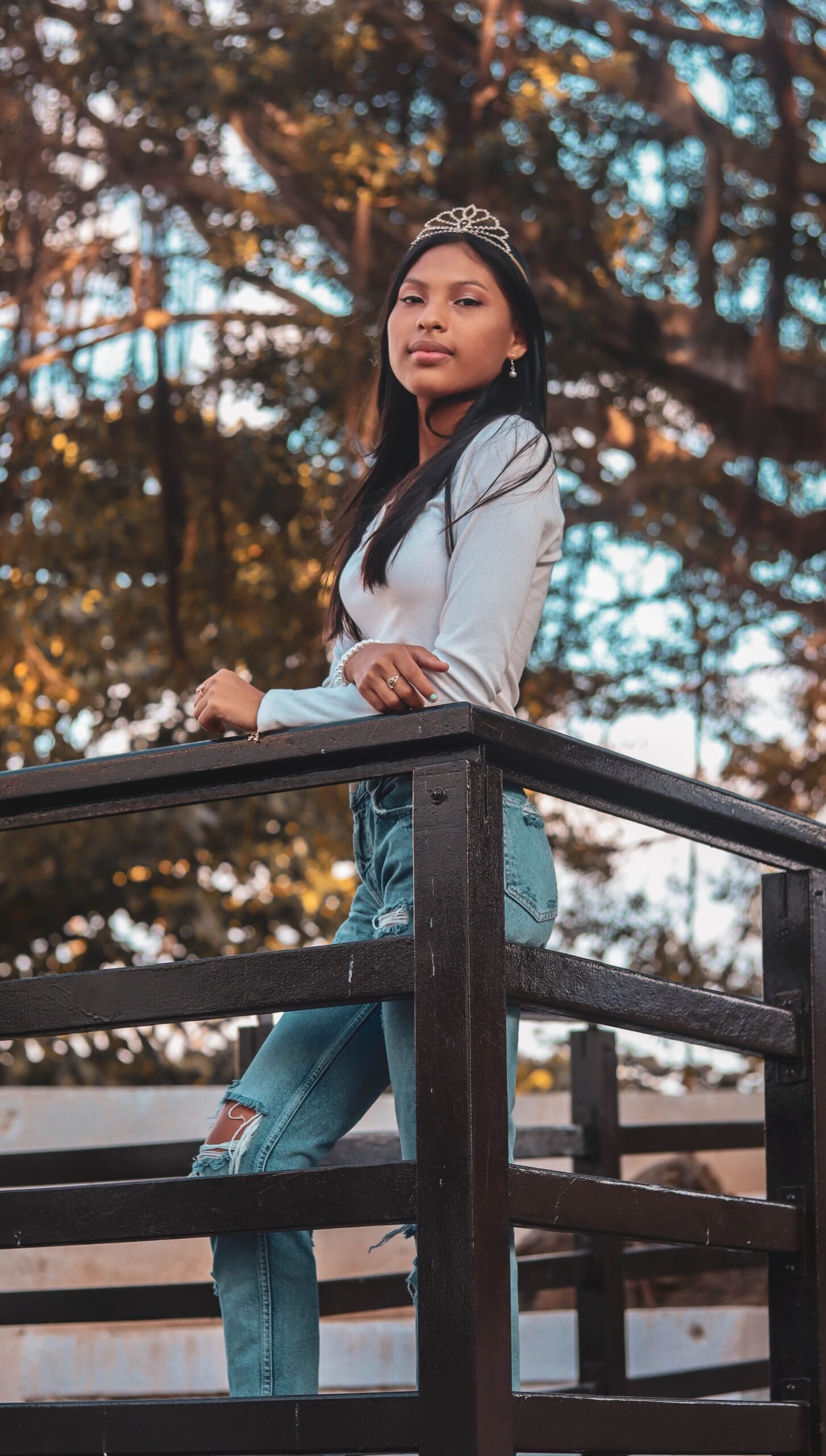 Woman wearing a tiara with casual jeans and t-shirt