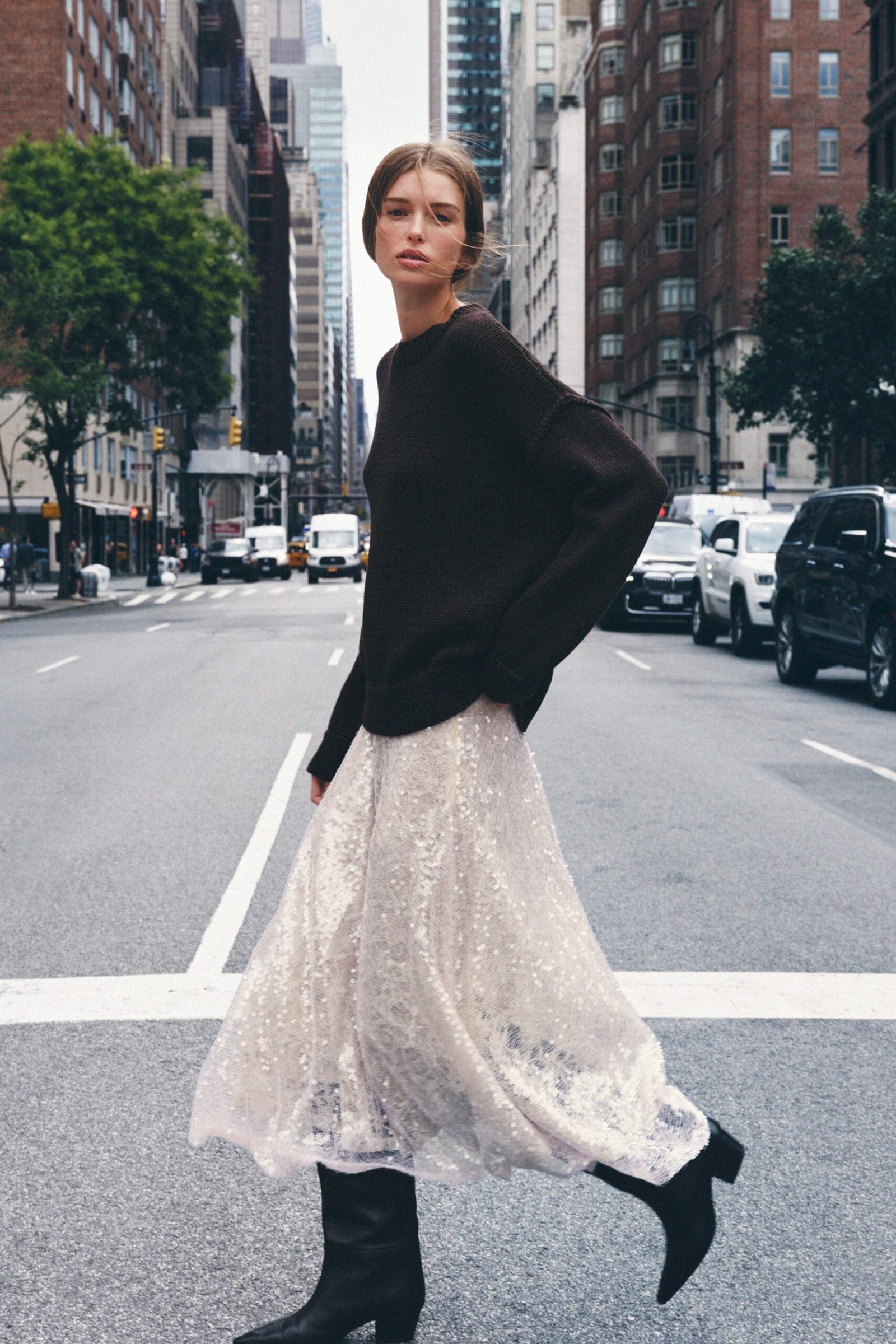 Woman in a sequin skirt styled casually for daytime