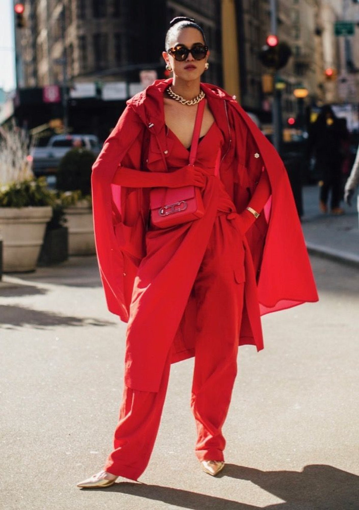 Woman in a monochrome head-to-toe team color outfit