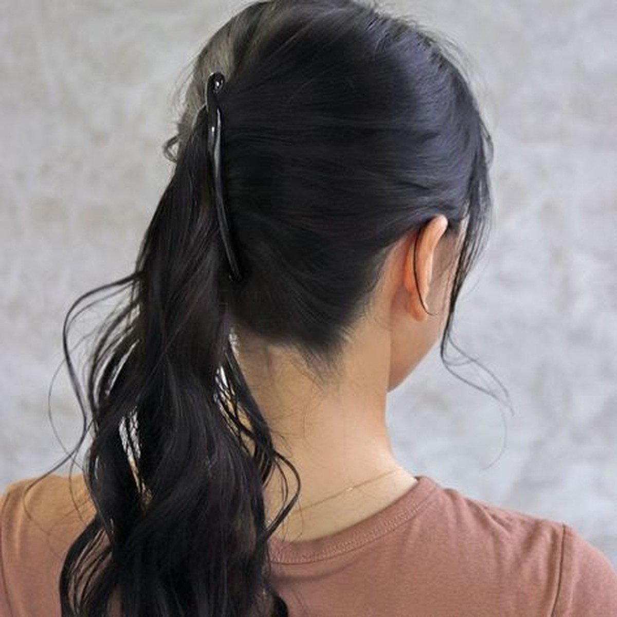 Loose Low Pony with a Clip hairstyle