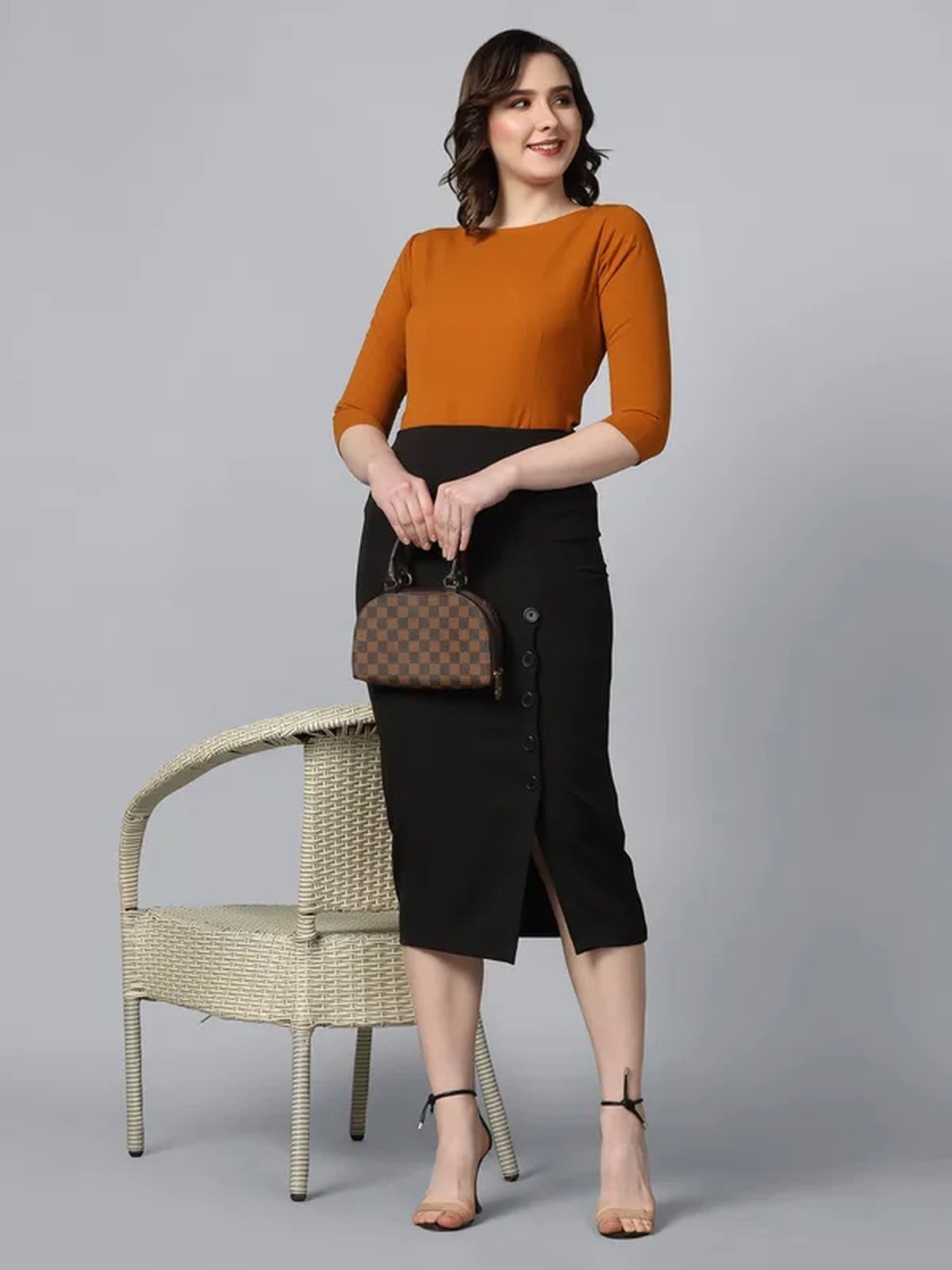 Black dress with orange accessories Halloween outfit