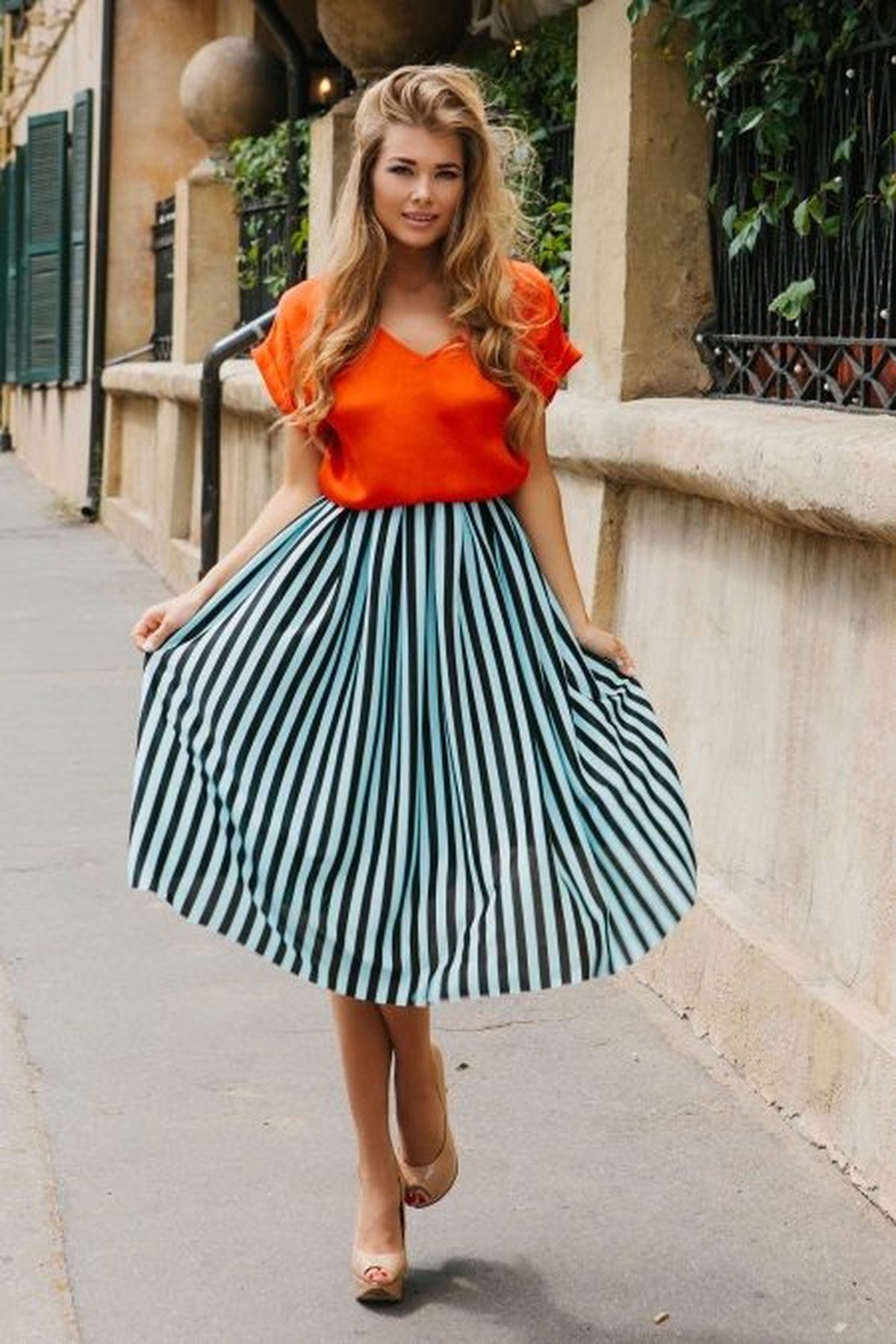 Orange midi skirt with black top October outfit