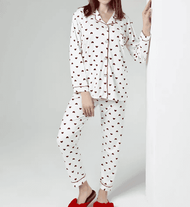 White pajamas with red piping matching Christmas pajamas for women