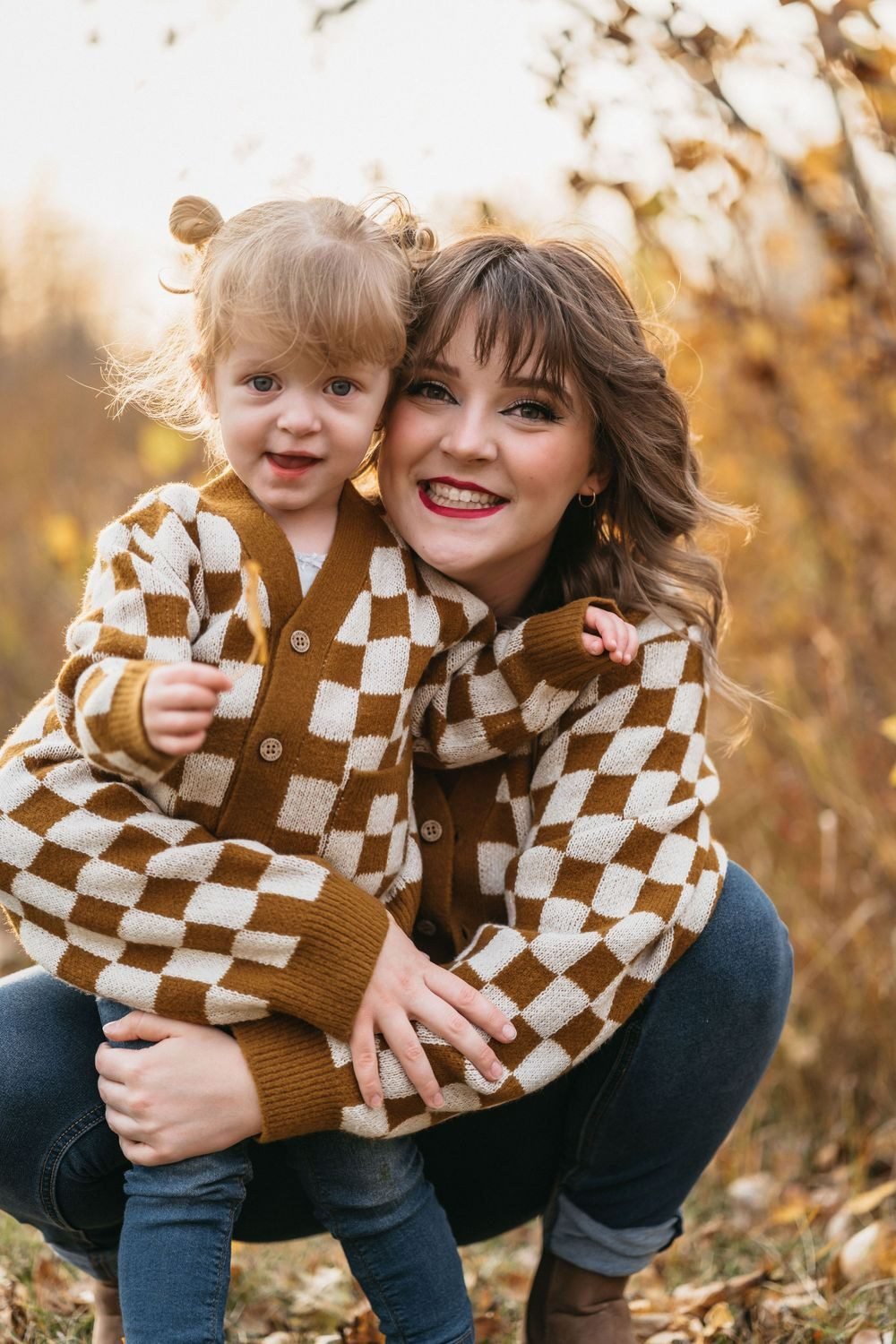 Mom and toddler in matching flannel pajama sets